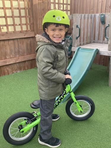 Bike ride in the garden at Gower Day Nursery