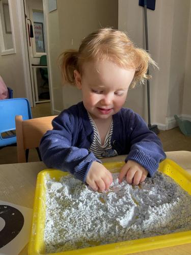 Tracing letters at Gower Day Nursery